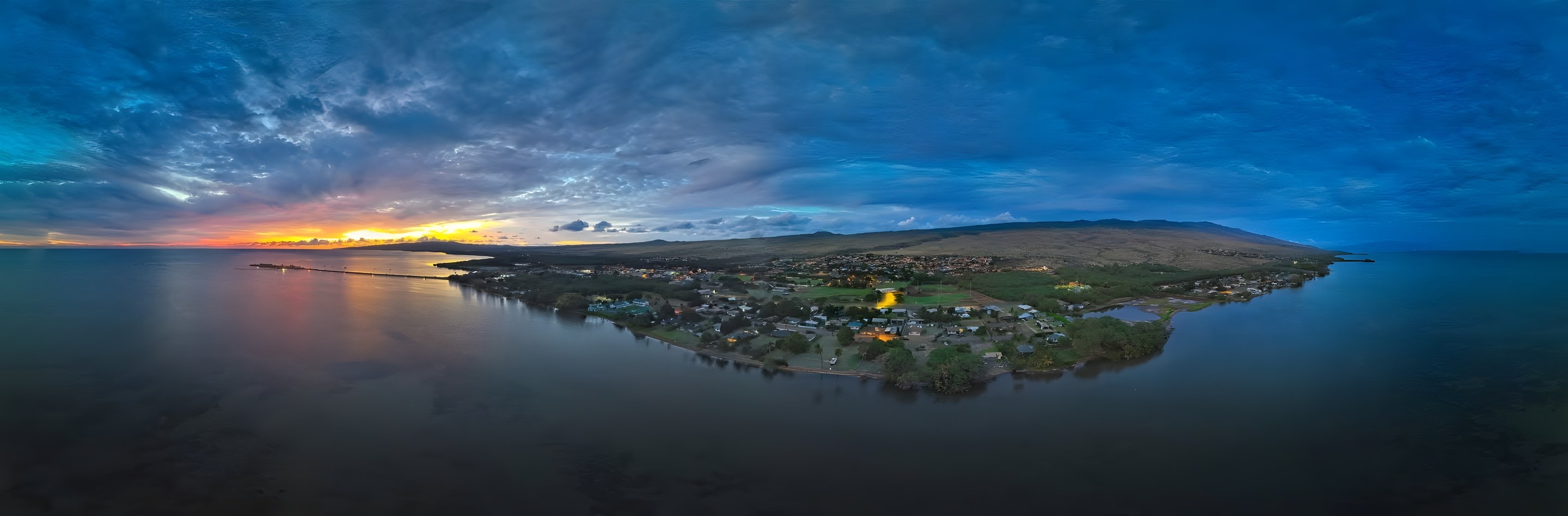 Aerial view of Kaunakakai and the south shore of Molokaʻi at sunset